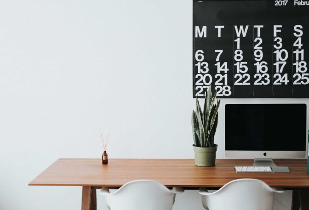 calendar above desk